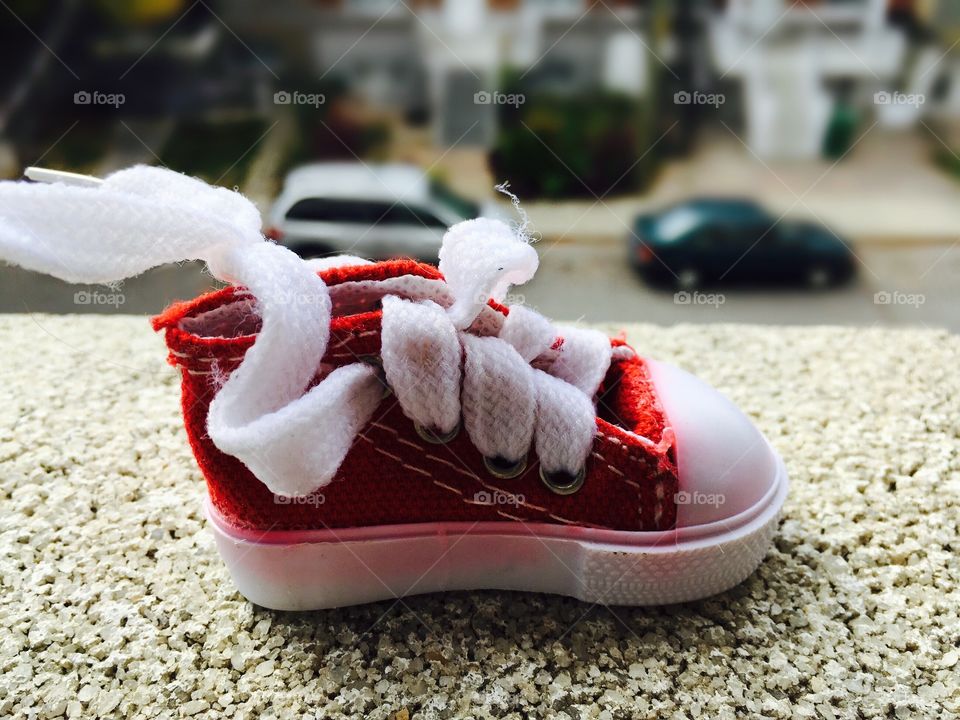 This shoe is one my daughters favorite toys . It's a miniature version of sneakers 