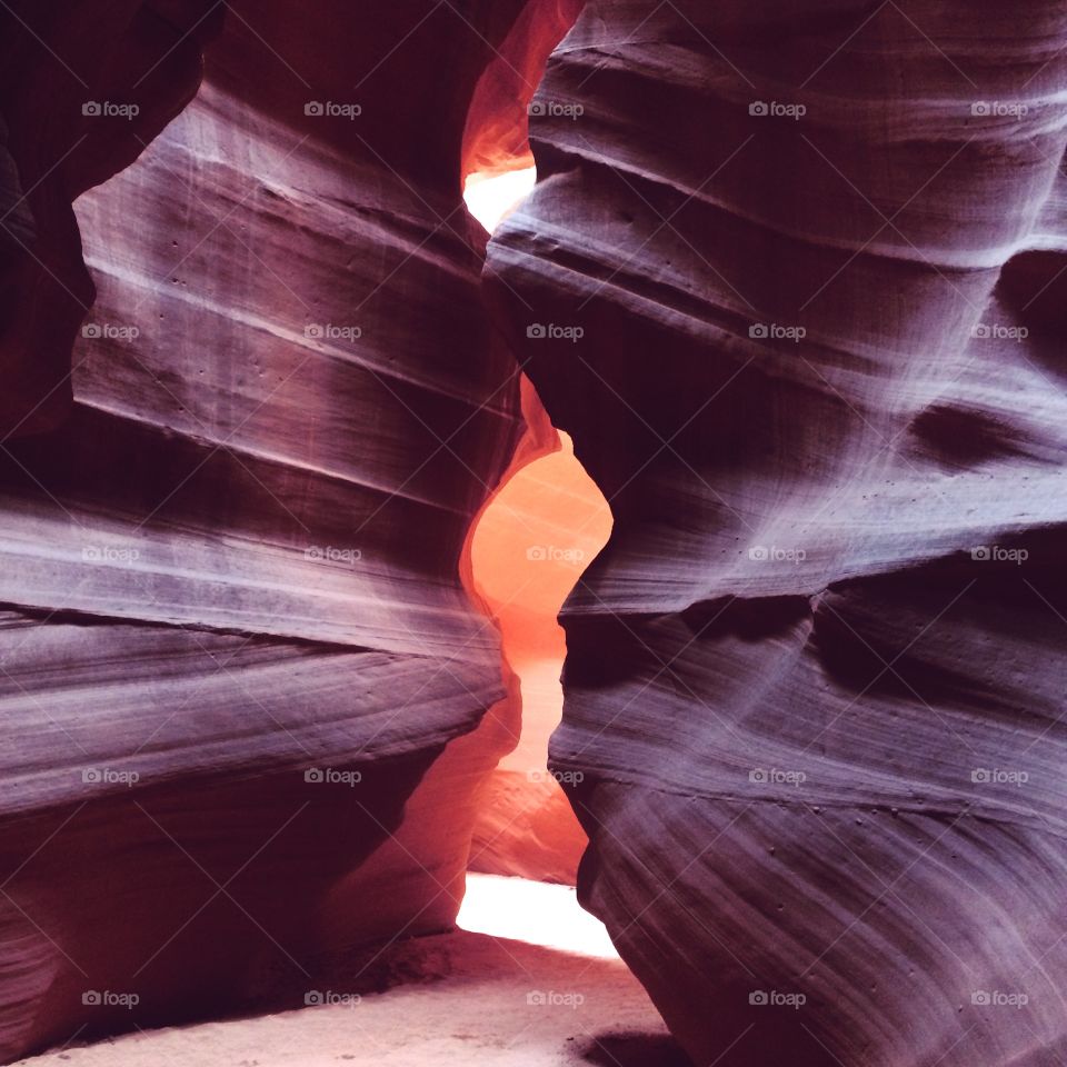Morning light filtering into Upper Antelope Canyon. The ever-evolving sandstone lines tell the stories of the flash floods which have swept through the slot canyon. 