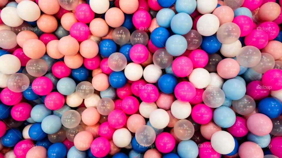 playing colorful balls on the playground