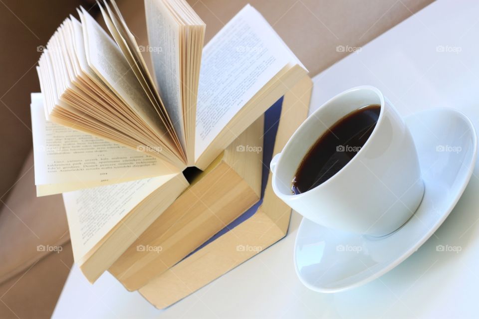 Books and coffee mug