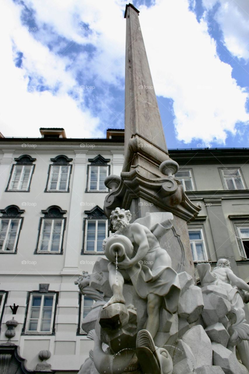 Statue and a building in Ljubljana Slovenia 