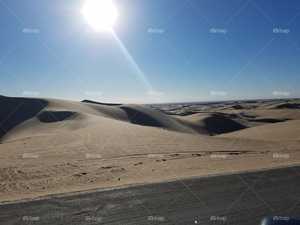 desert sand dunes sun setting
