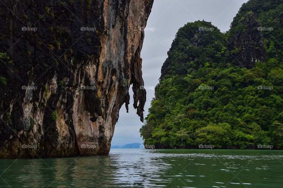 Sea kayaking through the limestone karst of the Phang Nga bay 