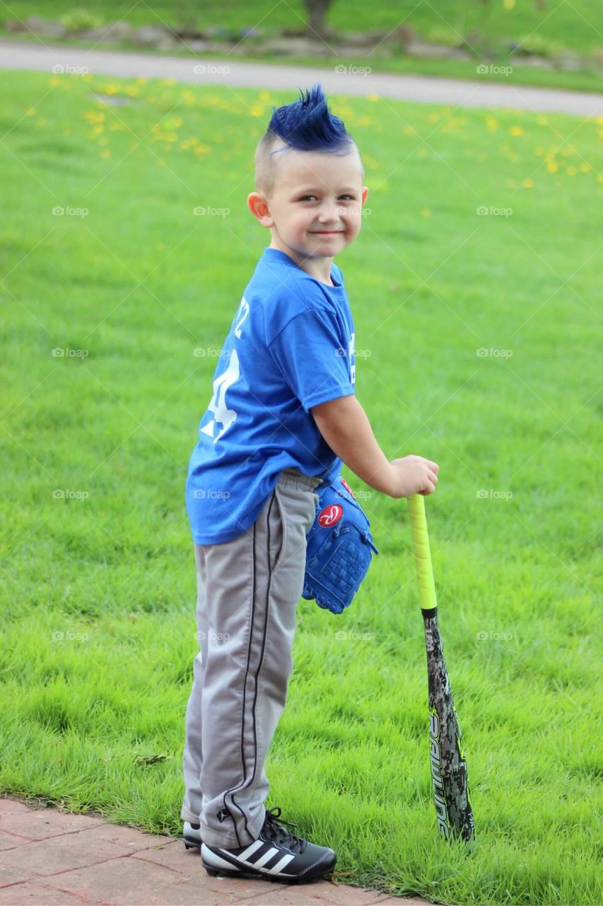 My adorable little blue haired T-ball player looking cute and ready for his first game of the season. 