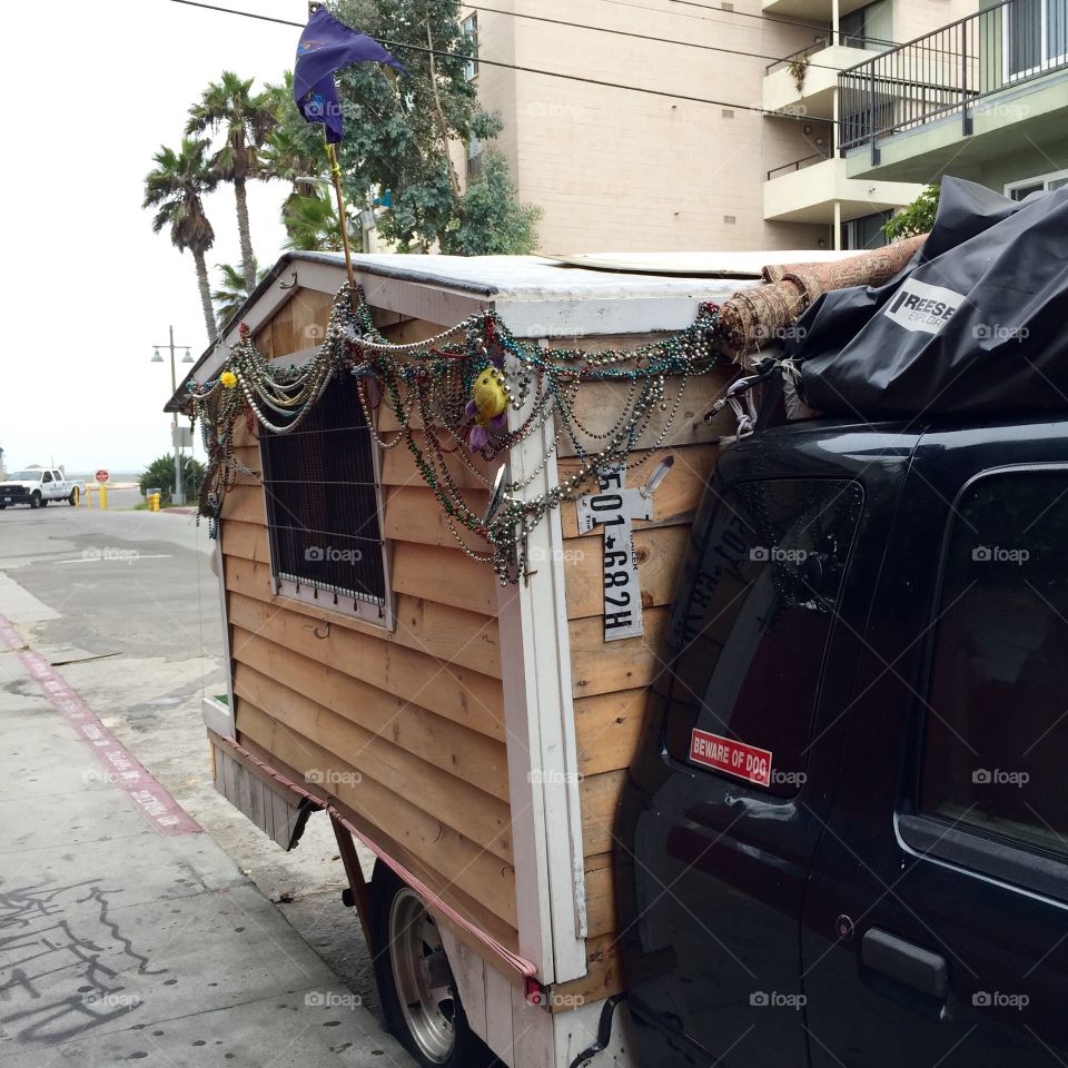 This little mobile cottage is built into the back of a truck and ready to move on at any time