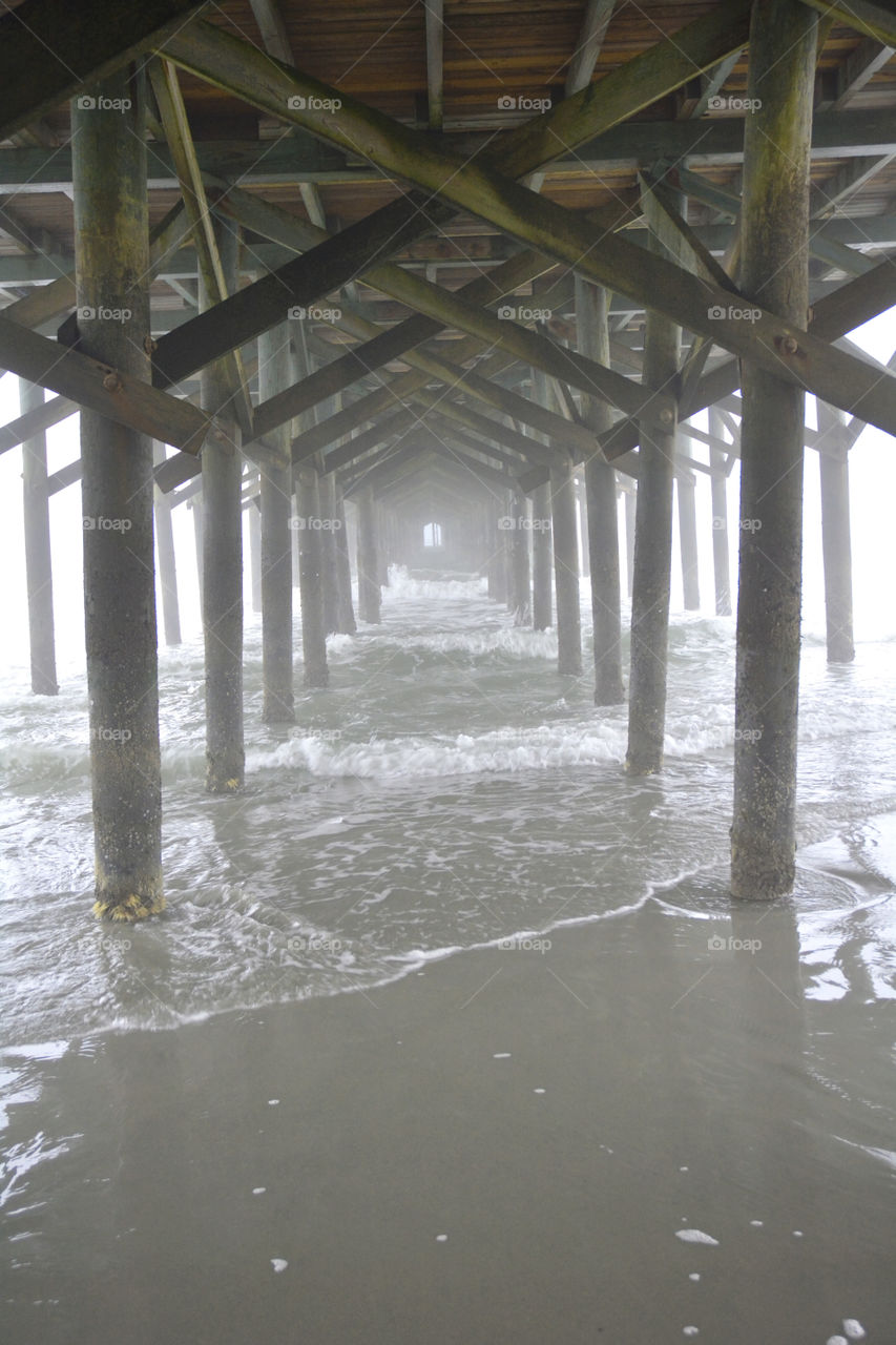 Foggy day under the pier.