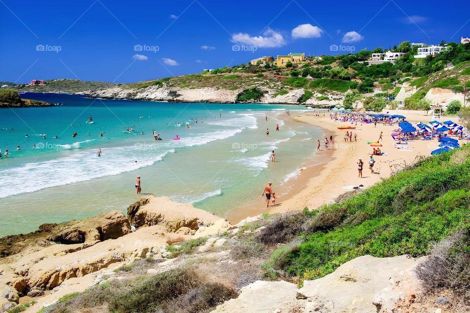 greek beautiful beach with island in Greece