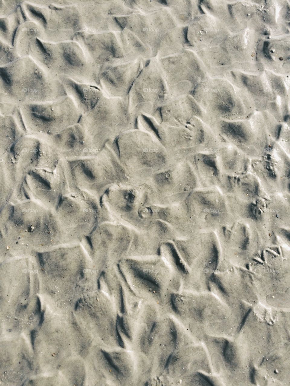 Ripples in the sand.