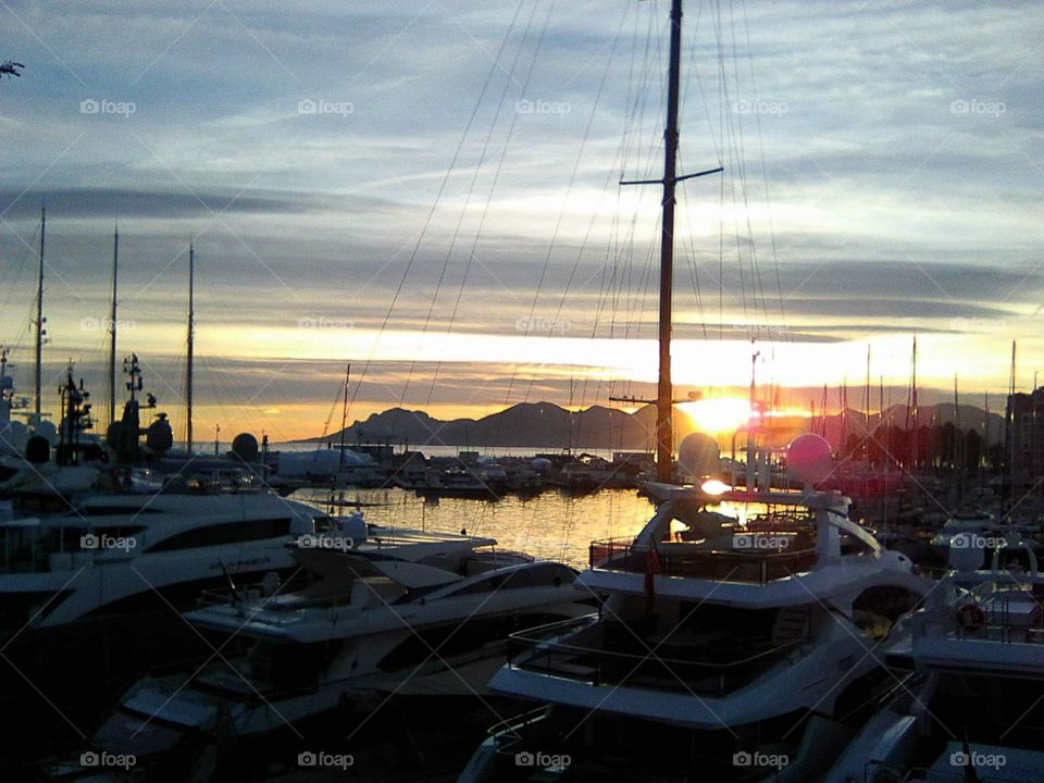Cannes sunset over the boats in the Harbour