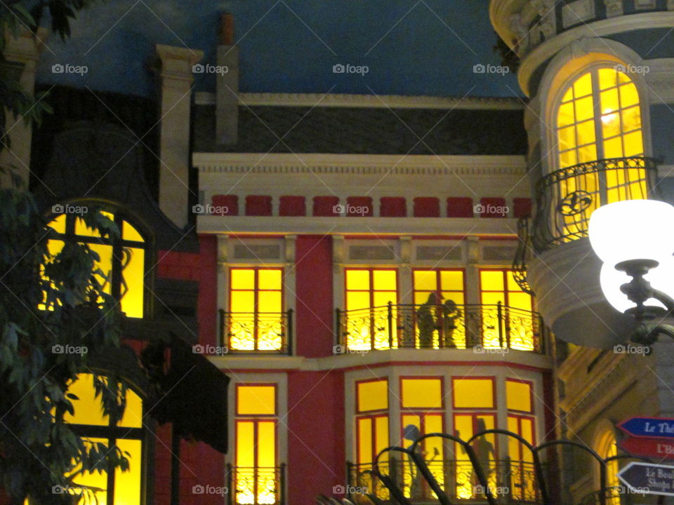 Inside of Paris Casino and Hotel, Las Vegas, Nevada. The Strip.  Silhouette of Couple Kissing in Window.