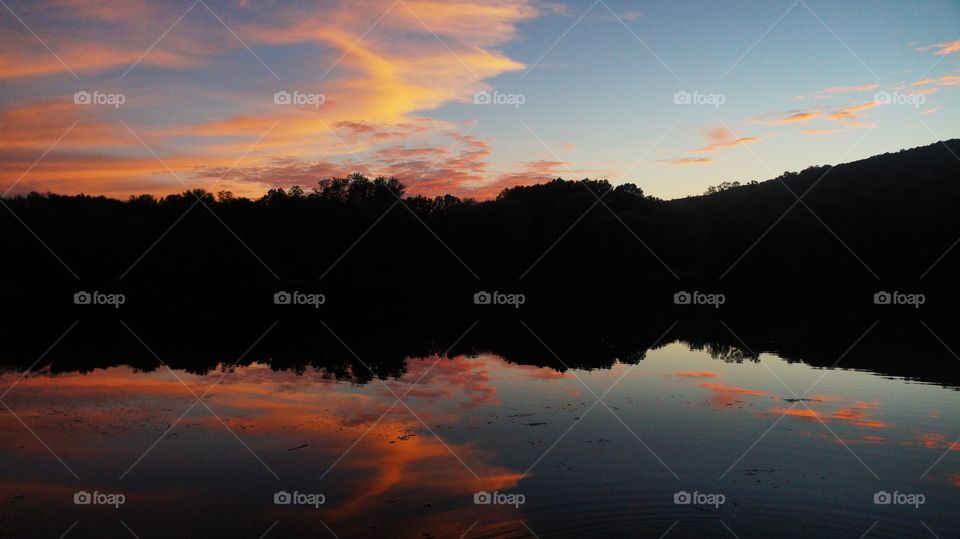 A lake mirroring the sky 