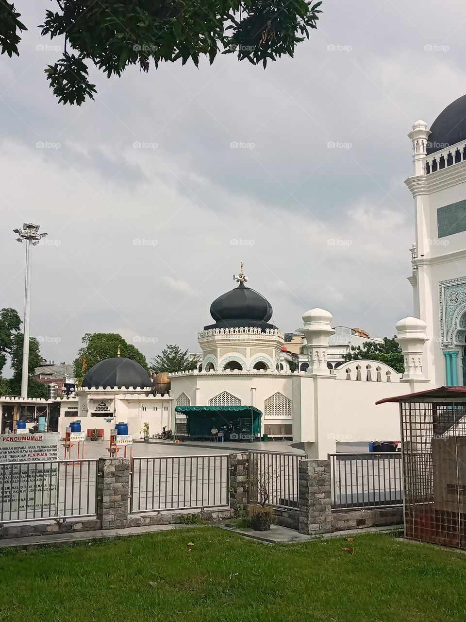 a mosque against the sky.  this mosque including into one of cultural heritage site in Indonesia