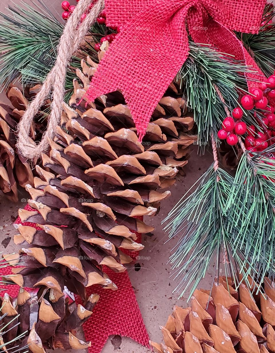 Pine Cones Ribbons and Berries