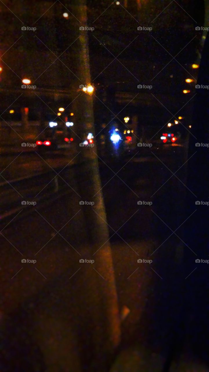 Blurry lights from a bus