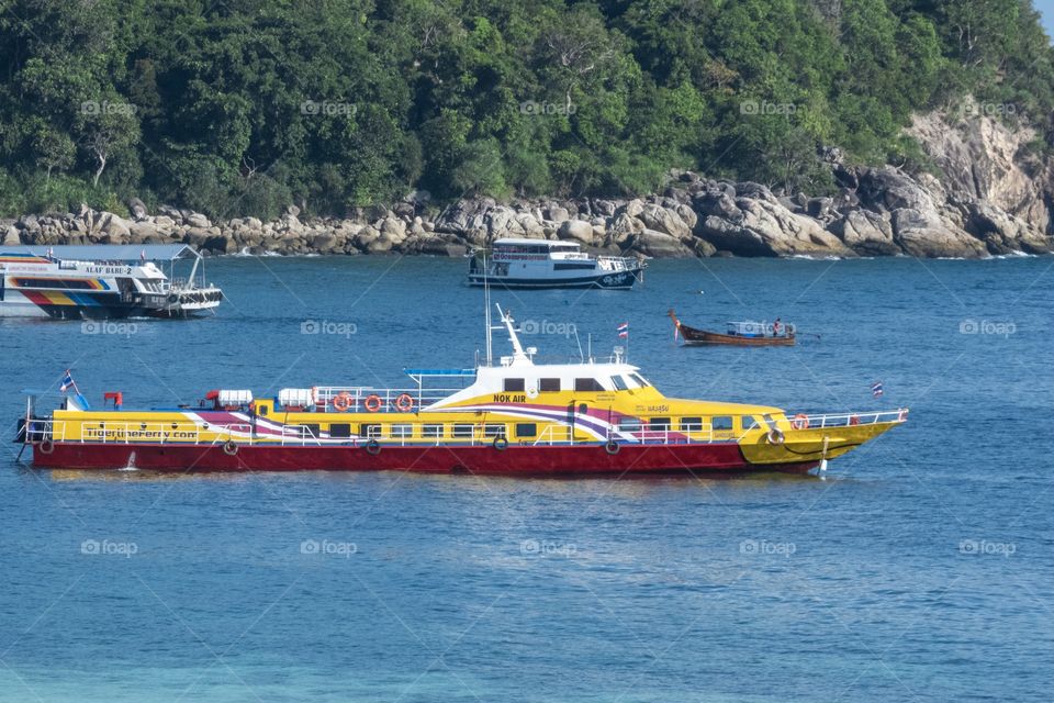 Beautiful color ferry In the blue sea 