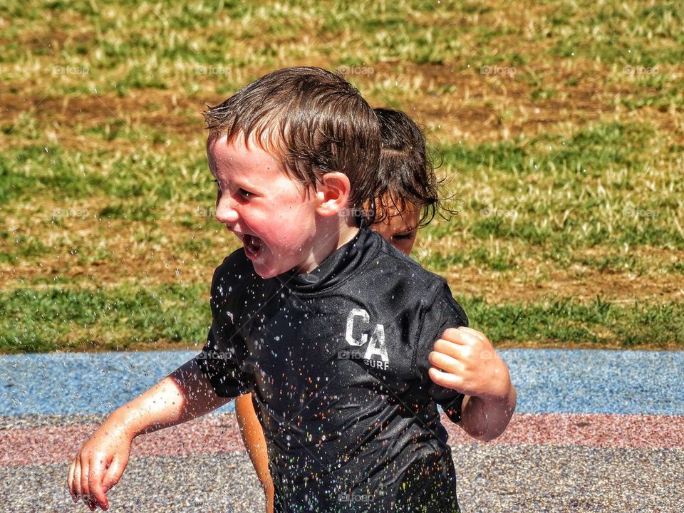 Child Playing in Water
