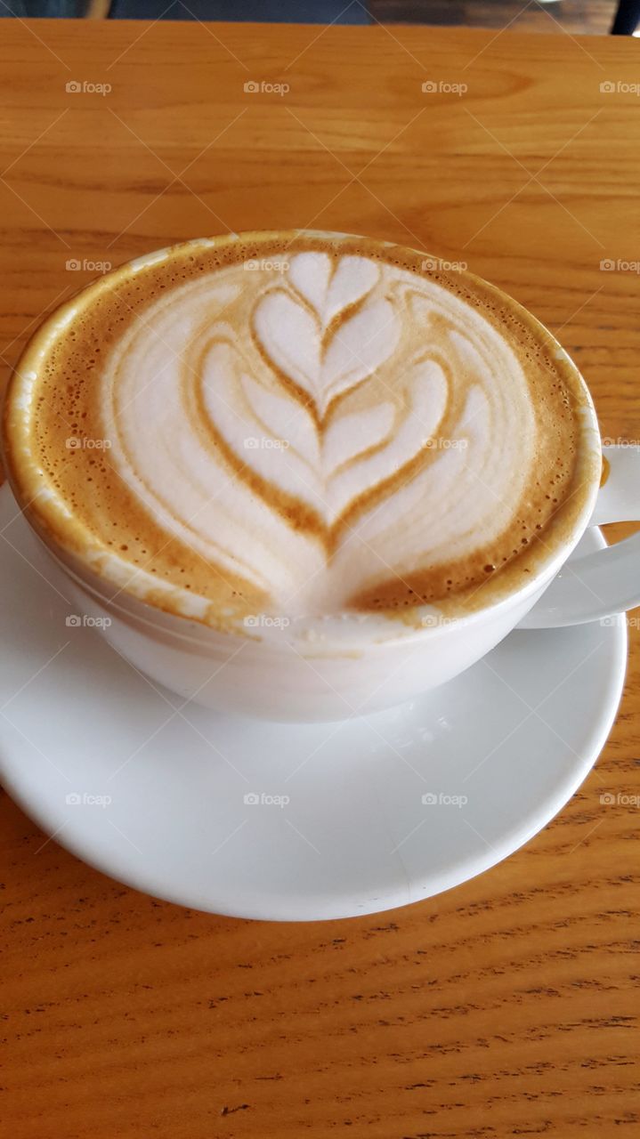 beautiful cup of latte coffee