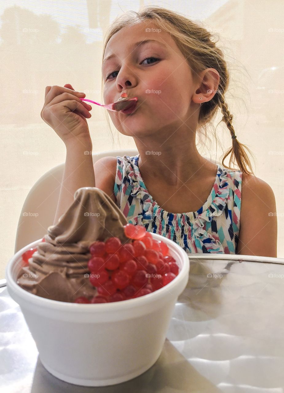 Father pulling his children sitting in cart