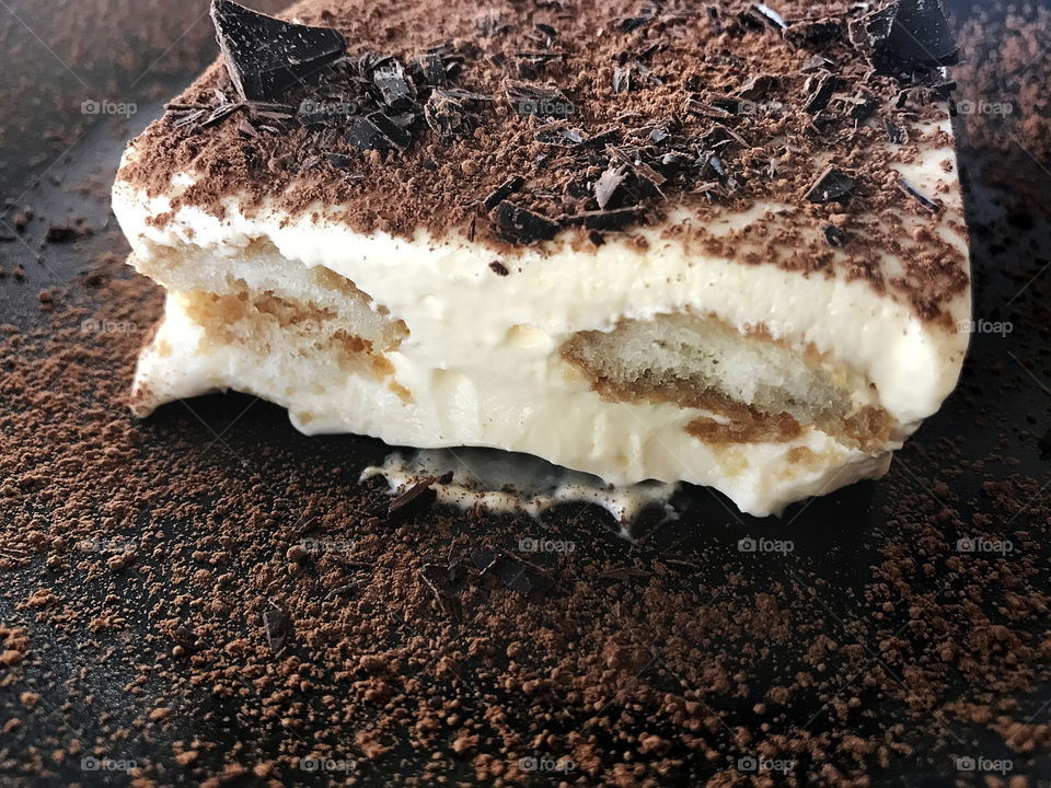 Freshly baked chocolate tiramisu with a cream 