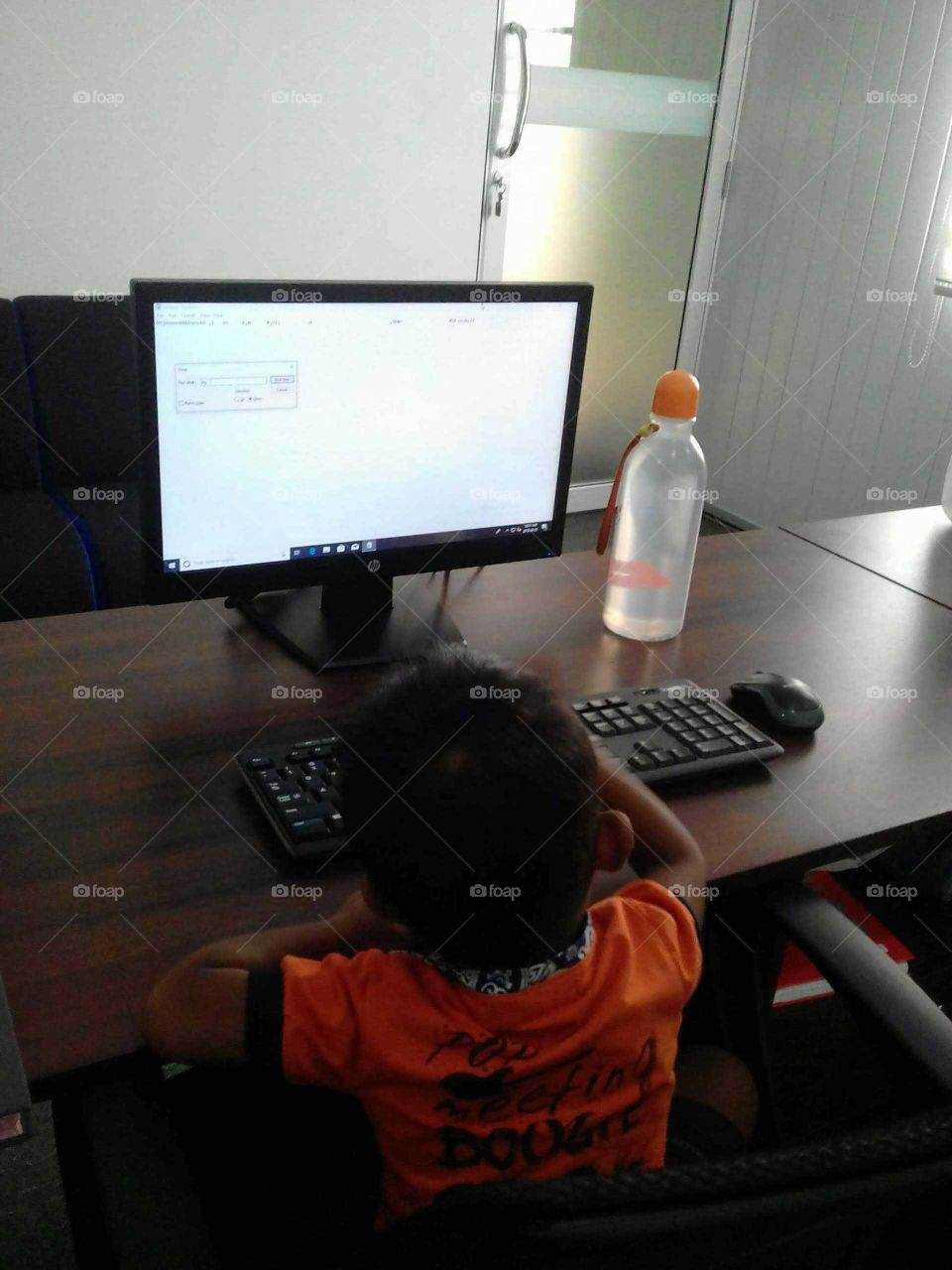 Child Studying to Computer..