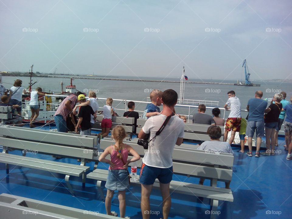 peoples travel on sea boat