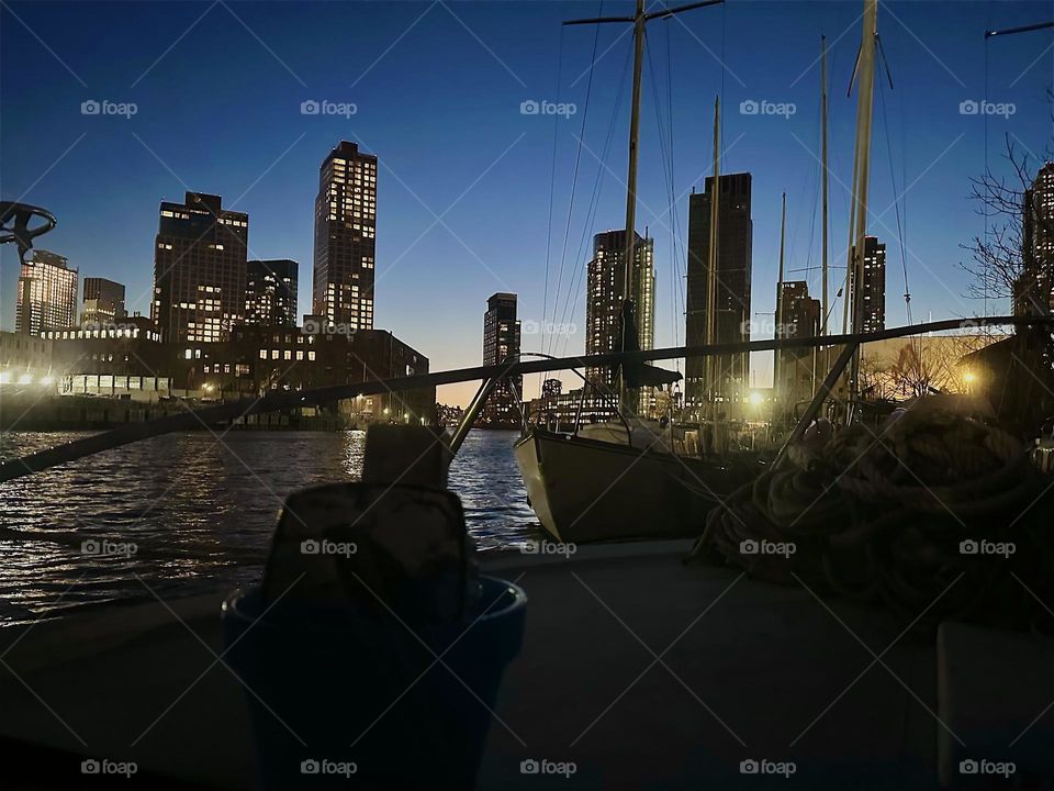 This is the view of „Newtown Creek“ by the „Pulaski Bridge“ in LIC, Queens from „Salvation“, the „28 foot 1969 Luhrs“ cabin cruiser that I and my longtime partner „Timothy Trespas“ call home. 2024. Hypnotic Productions