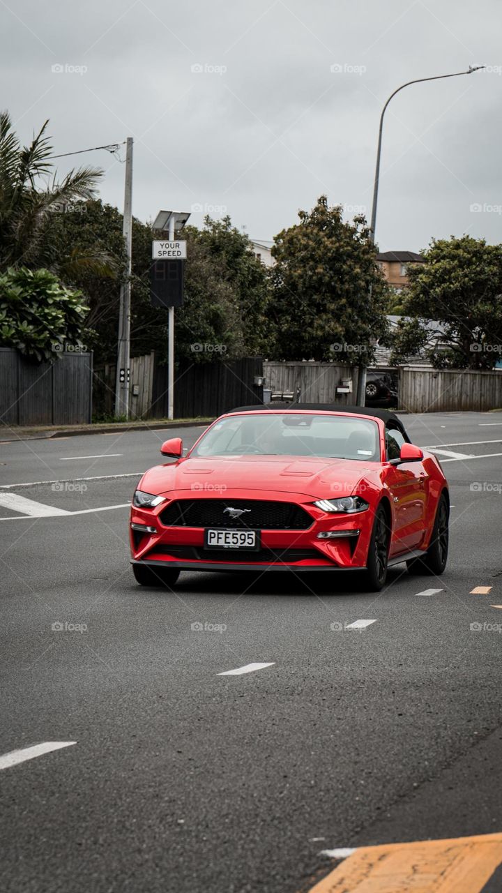 Beautiful red car on the road