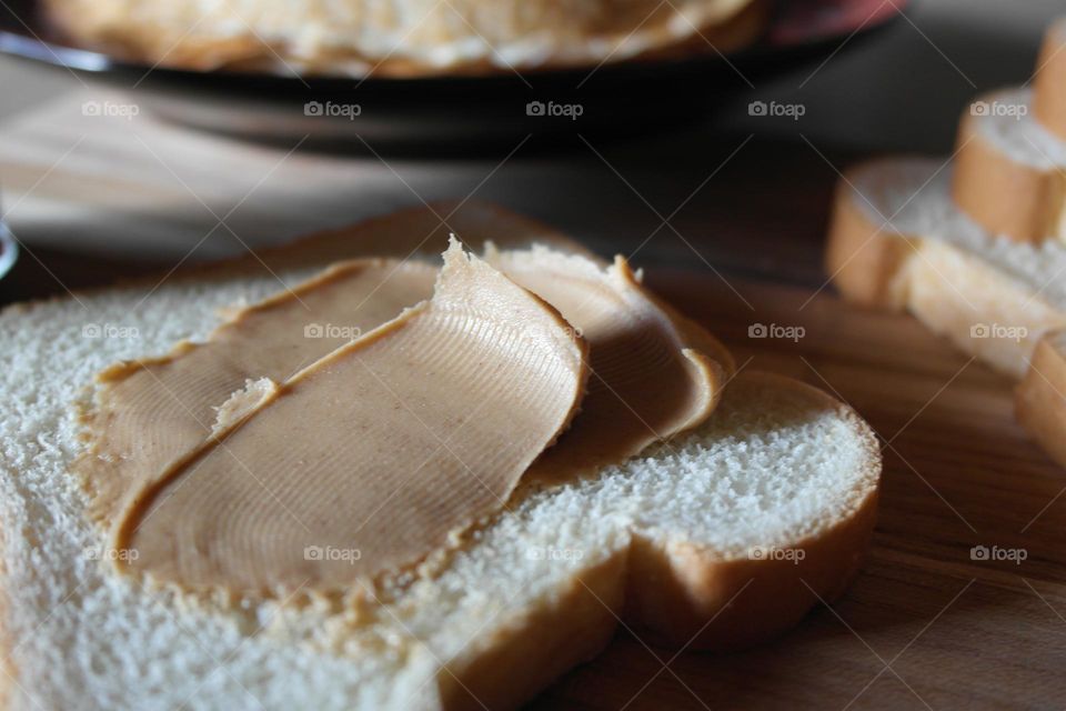 Peanut butter on a slice of bread 