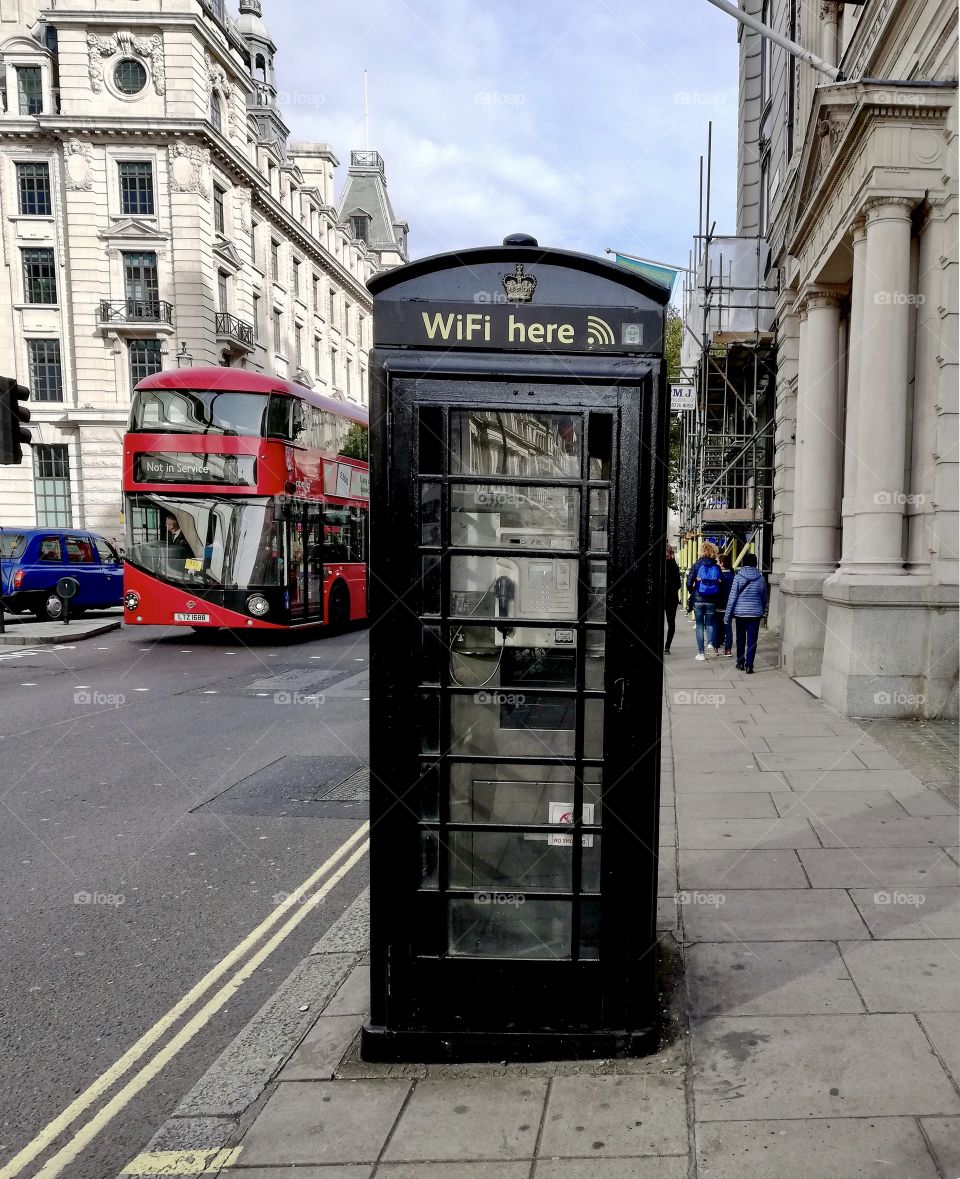 Black old phone box  in a new WiFi version . London 