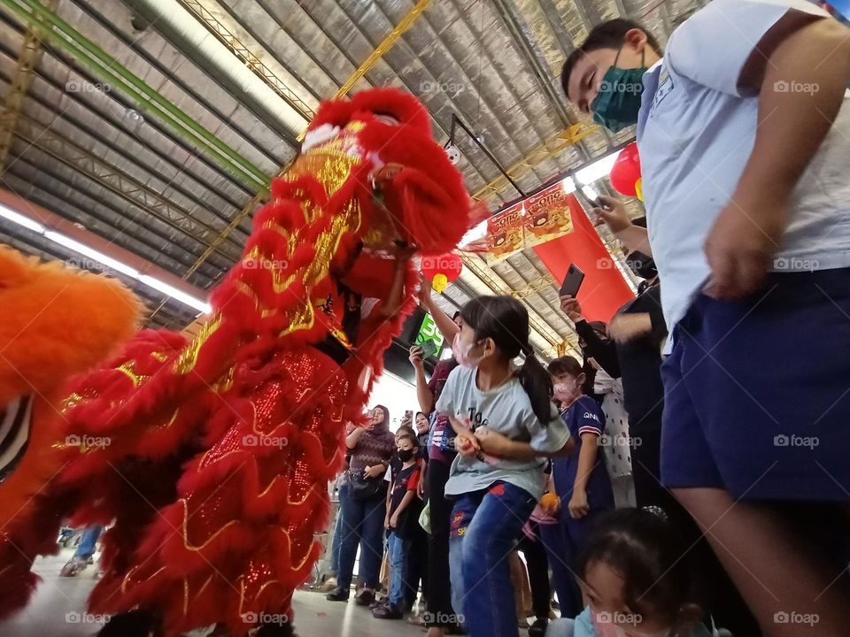 It is performed to bring prosperity and good luck for the upcoming year.