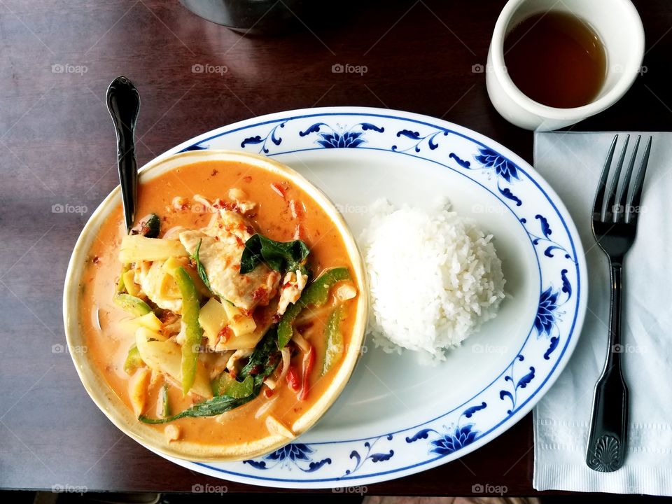 High angle view of chicken curry and rice in plate