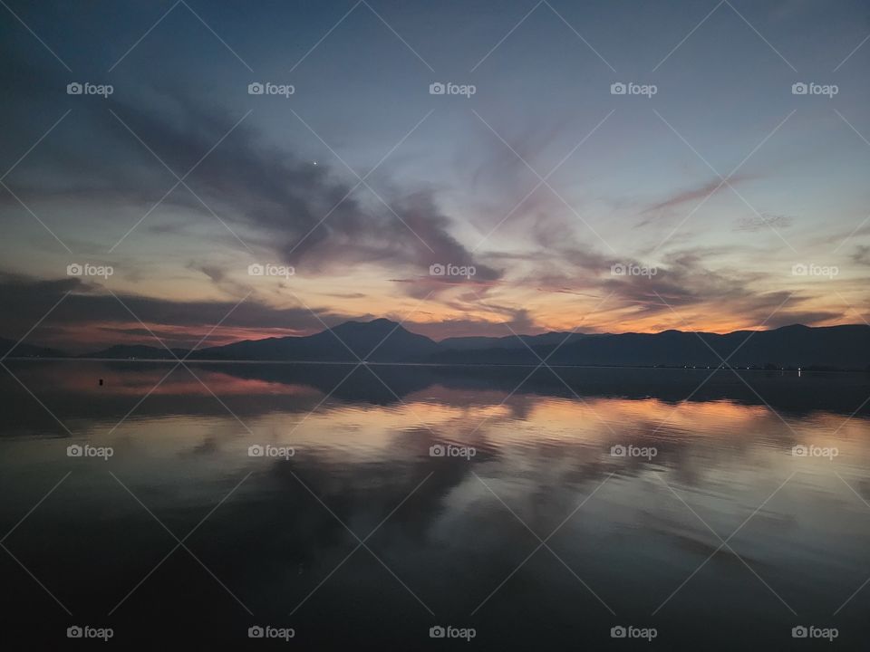 sunset reflected in lake