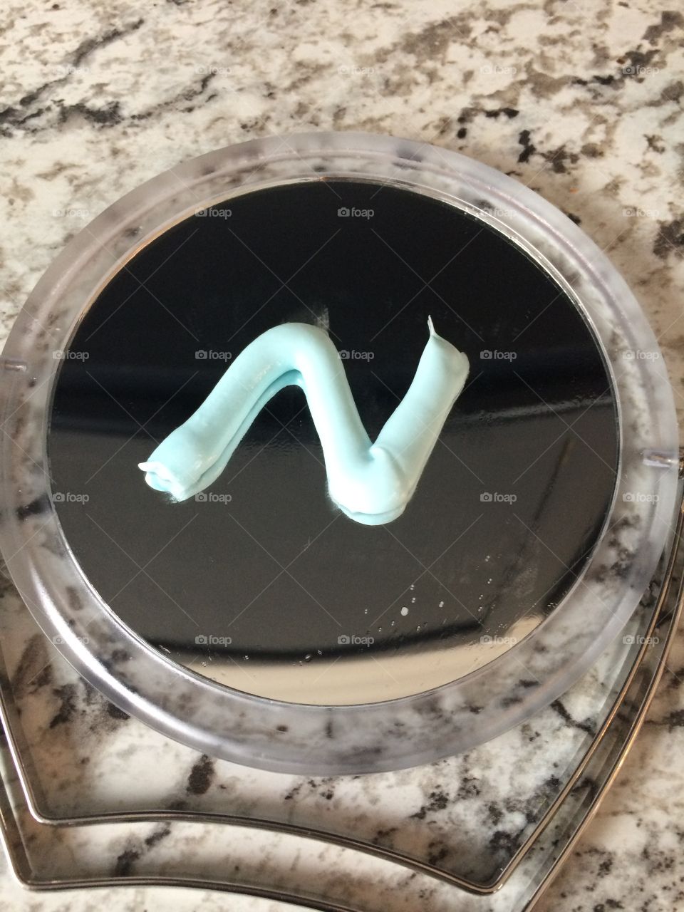 Tooth paste on a mirror