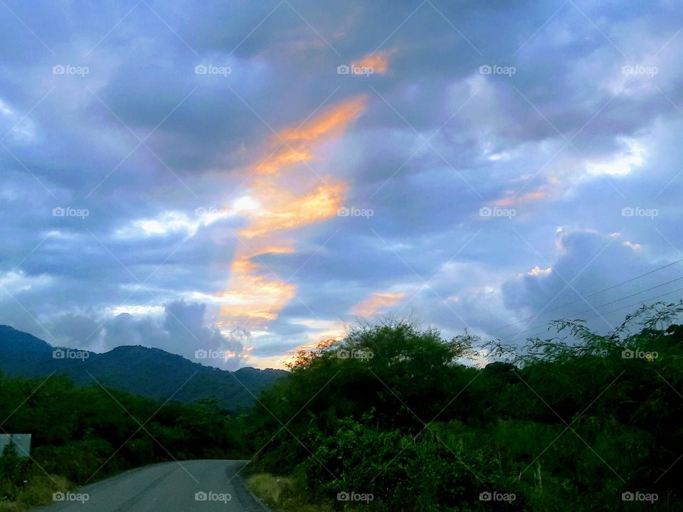 Sun rays in the storm clouds