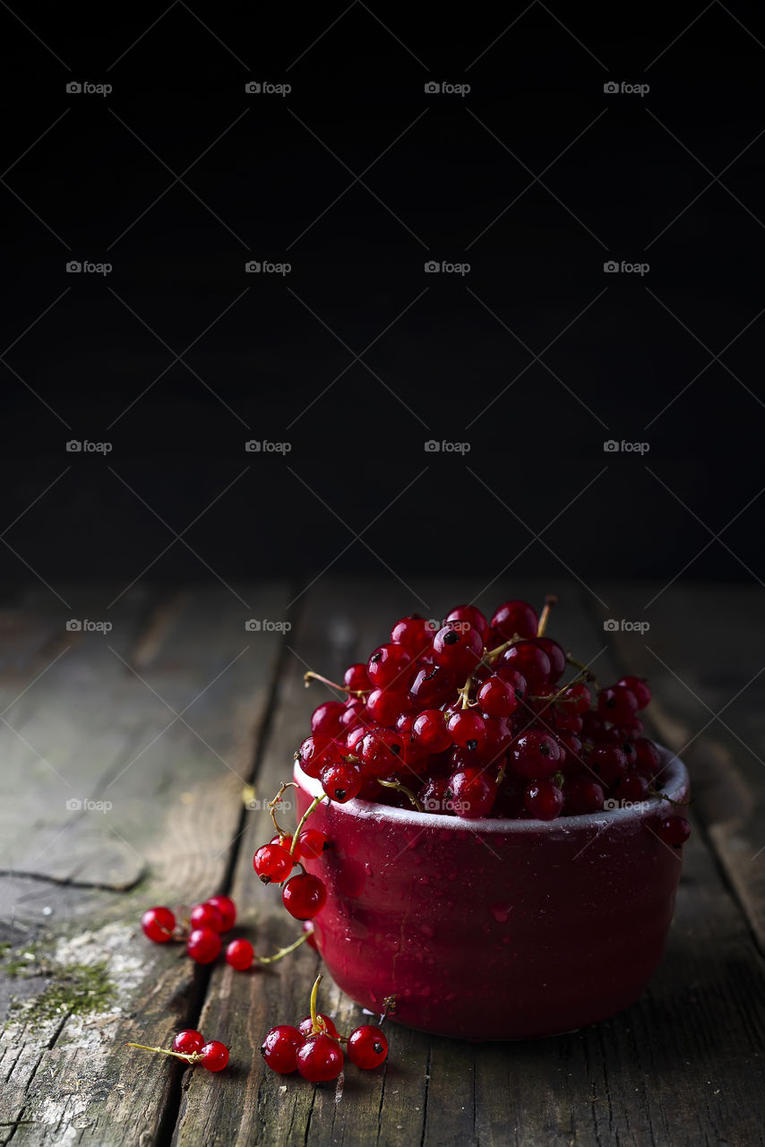 Close-up of red currant in bowl