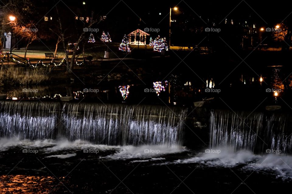 Nighttime Reflections Of Christmas Lights And Waterfalls Of Chagrin River Ohio