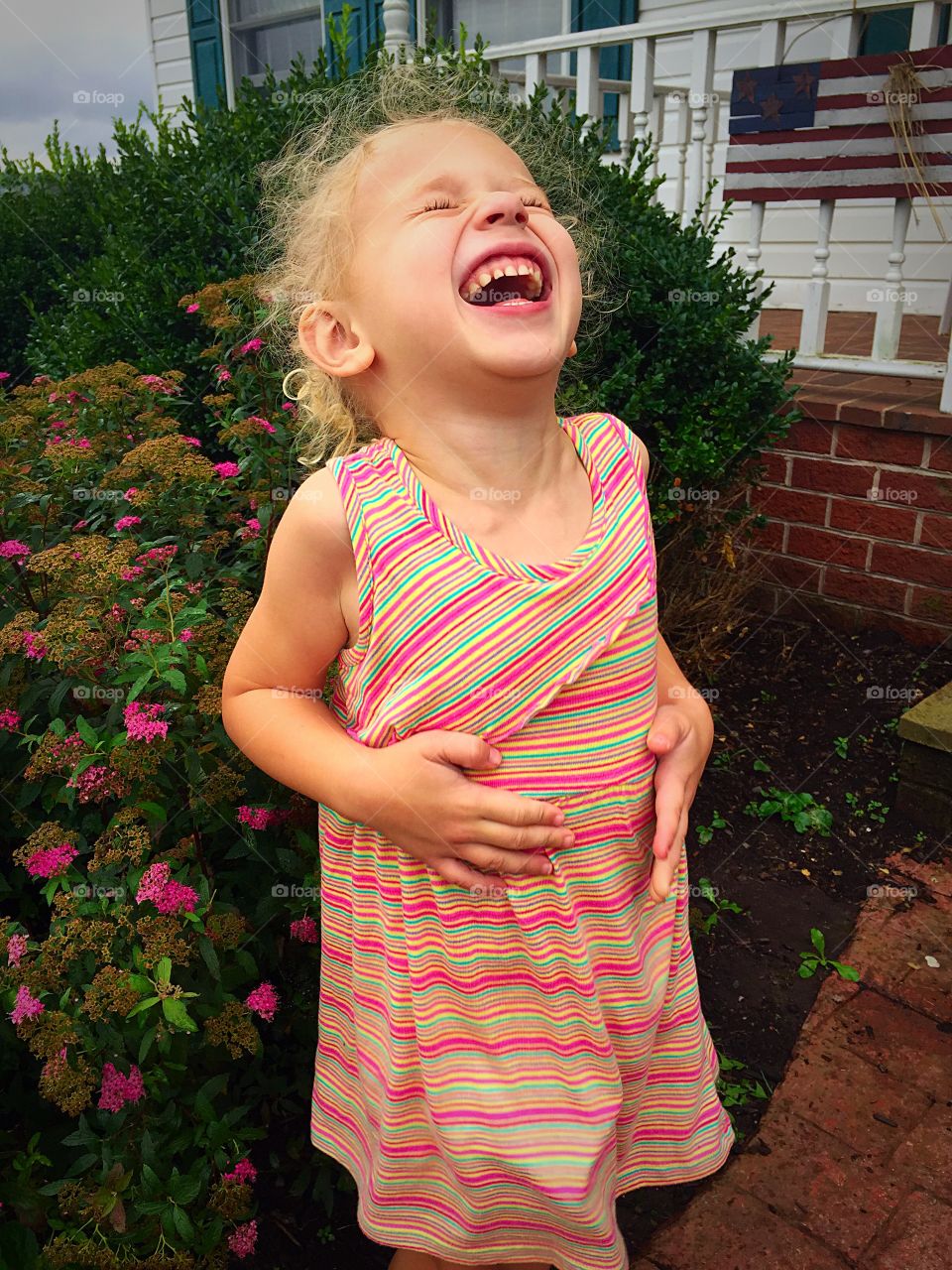 Portrait of a girl laughing