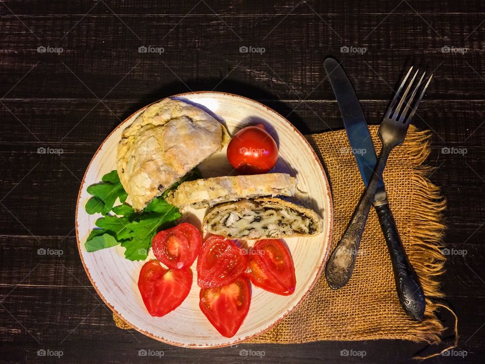 Strudel with mushrooms and chicken  with cutlery set