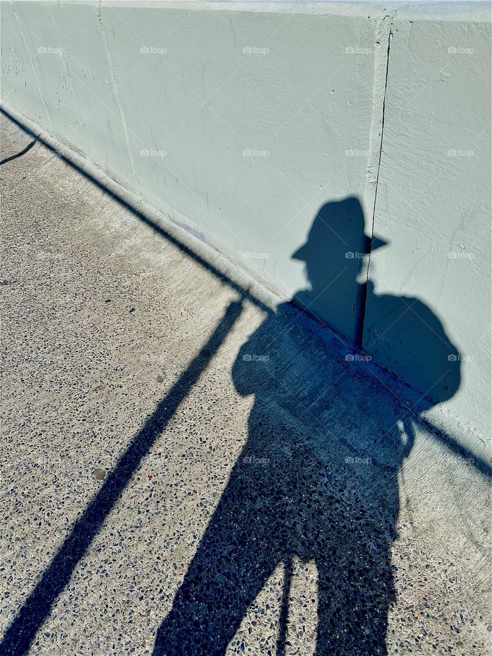 Expressive shadows are often created on the pedestrian lane of the “Pulaski Bridge” at “Newtown Creek” that connects “Greenpoint”, Bklyn to LIC, Queens especially in the late afternoon sun. 2024. Hypnotic Productions