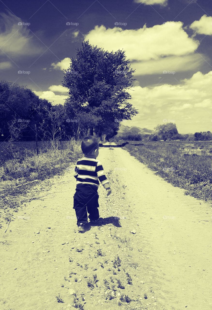 Baby Walking Down The Road