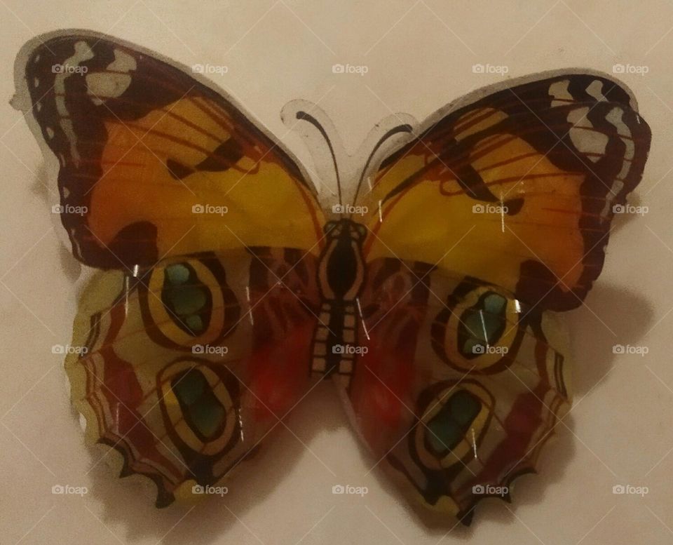 Beautiful butterfly in plastic.