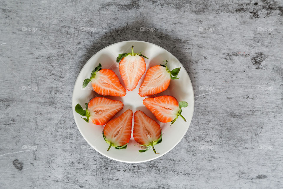 Fresh strawberry on white plate 