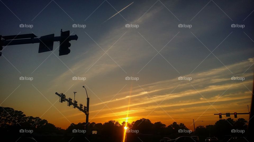 sunset or sunrise at intersection