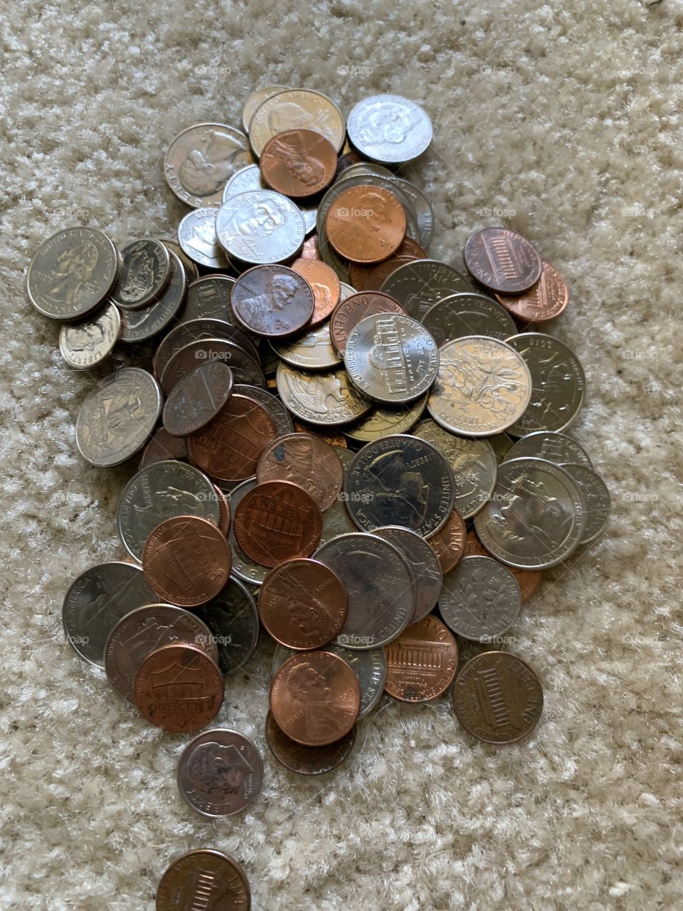 A pile of American coins saved up for something nice