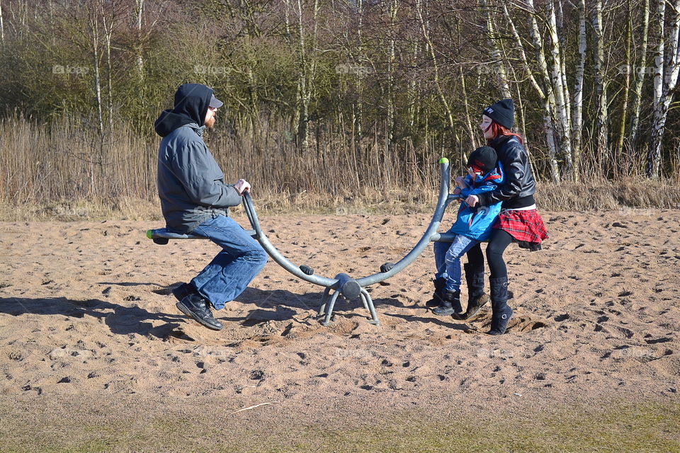 Father playing withhis children 