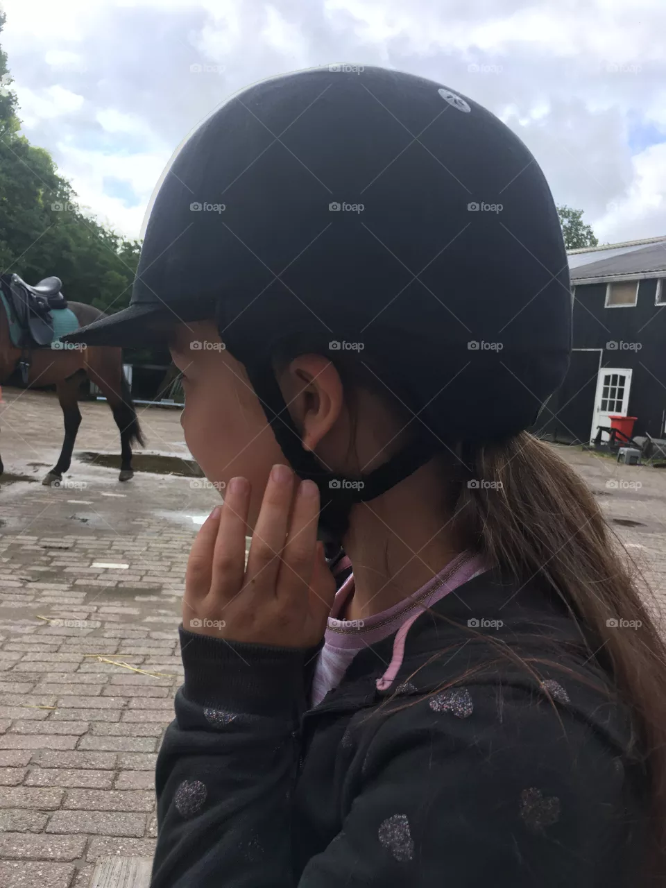 girl with cap on head