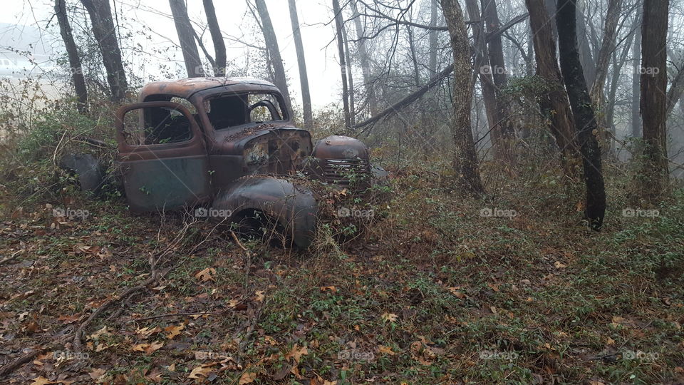 old forgotten truck in the woods