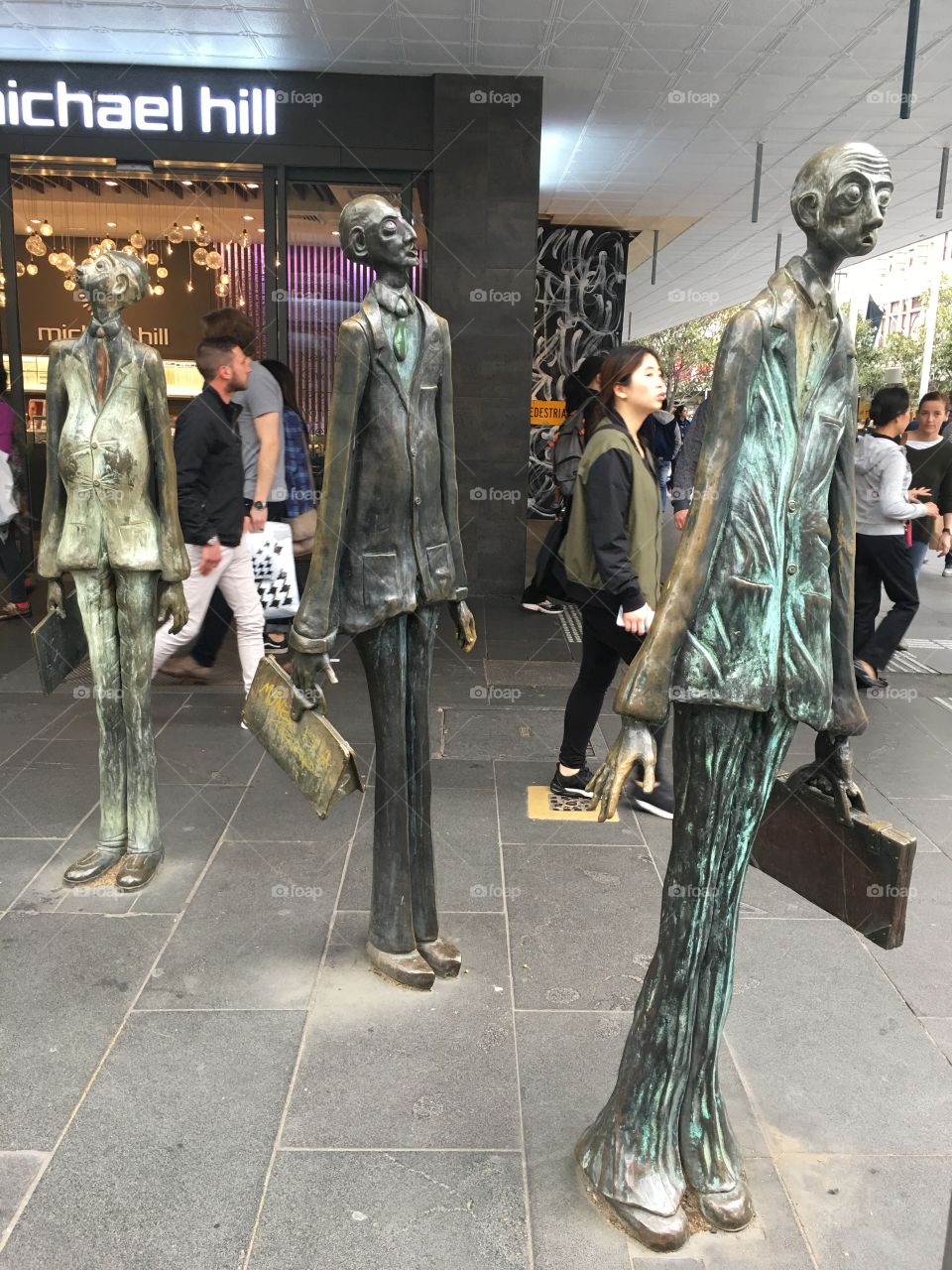 Statues on Bourke St Melbourne Australia. This street is lined with boutique and high end stores along with street performers. We heard some fabulous musicians who deserve to be signed by a label.