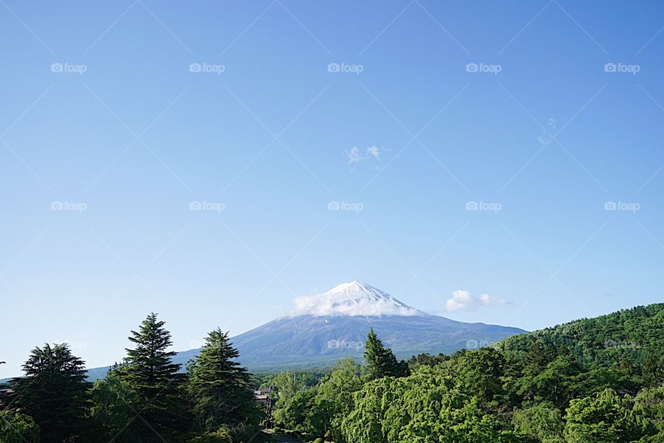 Fuji yama or mountain Fuji.  Mt. Fuji is the most beautiful volcano because it's perfect symmetric shape.