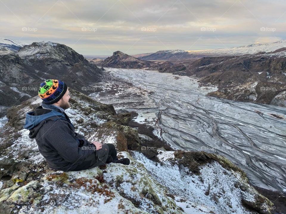 Exploring the nature. Pause after climbing the snowy mountains in Iceland.